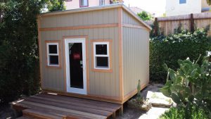 Photo of a 10 by 12 lean-to studio with one French lite door